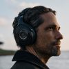 Man wearing Focal Bathys Black Edition Wireless Headphones